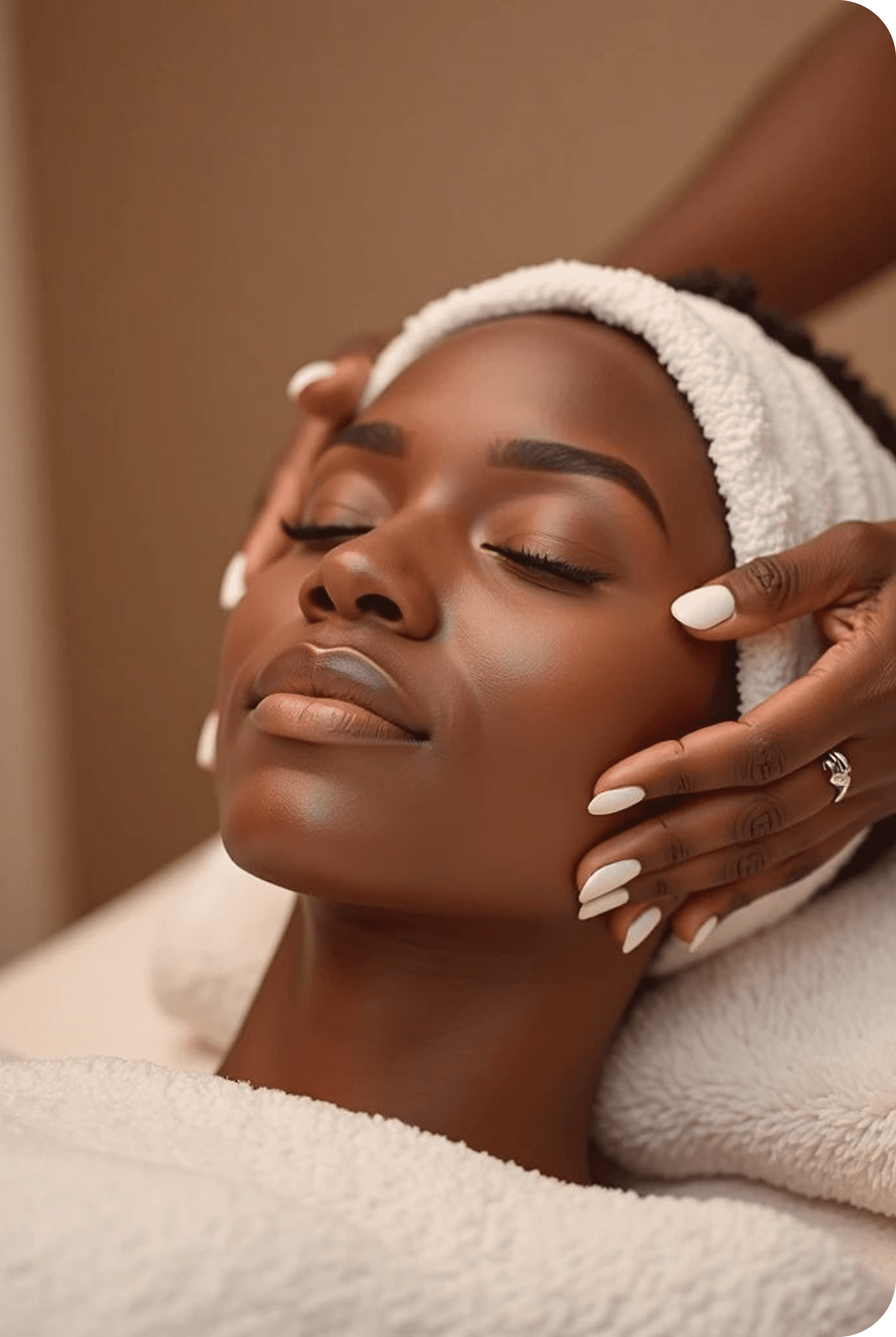 Beauty professional giving facial treatment